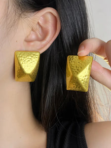 Golden oversized studs