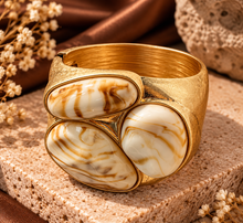 Load image into Gallery viewer, Gold cream tone bracelet
