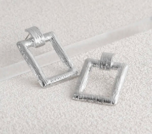 Silver textured square